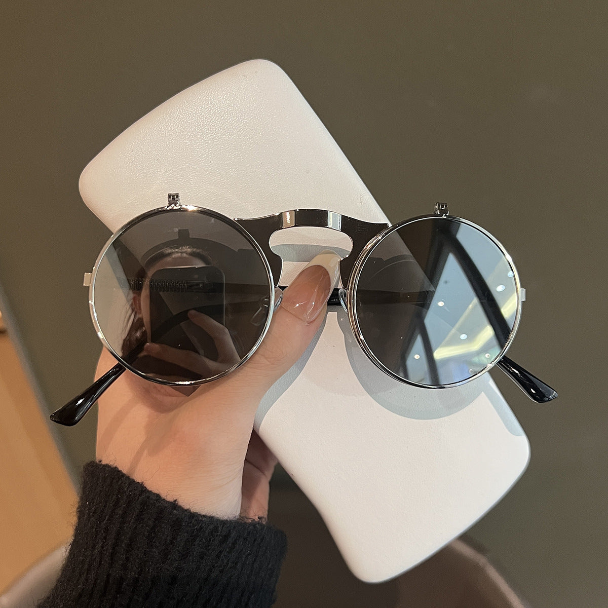 Damen Runde Designer-Sonnenbrille mit innovativem Rahmen Karnz
