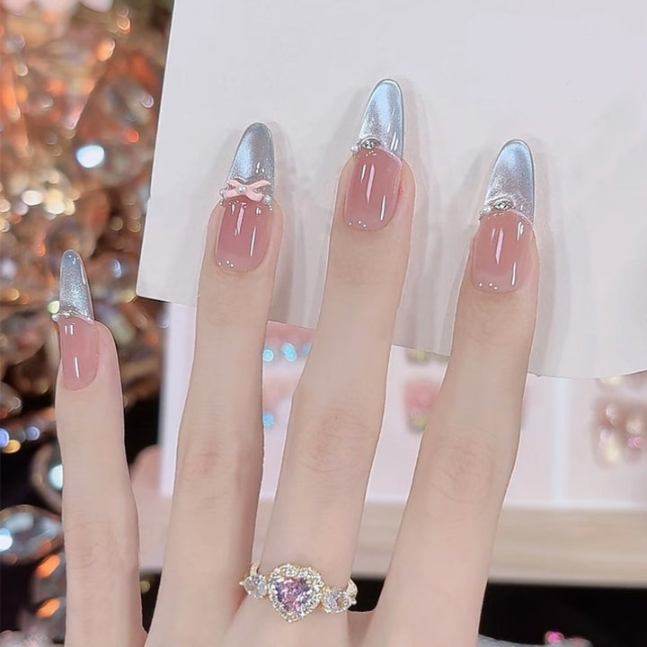 Künstlerische Stiletto Press-On-Nagelset mit Leopardenmuster und Schleifenakzenten Karnz