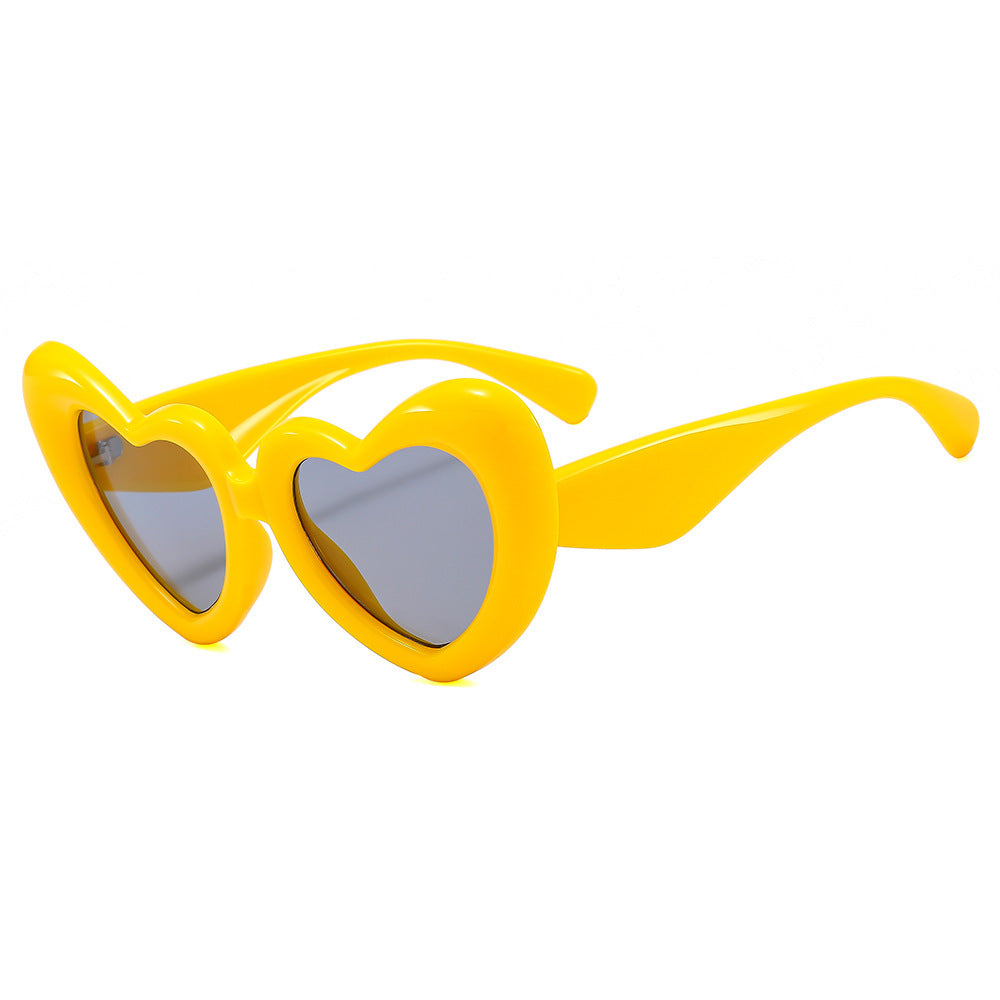 Damen Herzförmige Sonnenbrille mit stylischem Rahmen Karnz