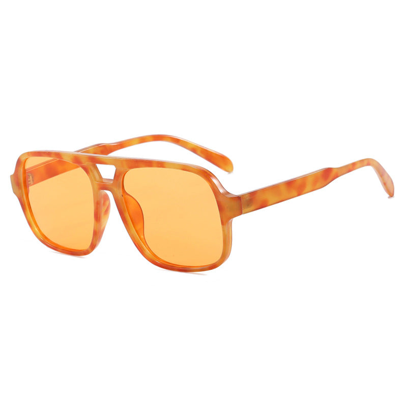 Damen moderne quadratische Sonnenbrille mit stylishem transparentem Rahmen Karnz