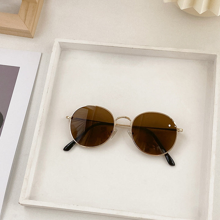 Modische Runde Sonnenbrille mit Goldener Fassung Karnz