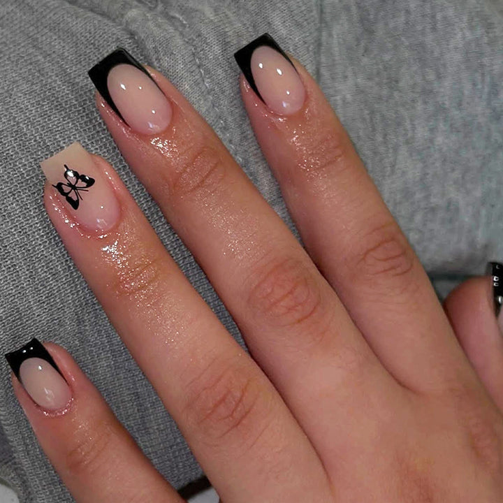 Dekoratives Press-On Nagelset mit eleganten Schleifenakzenten Karnz