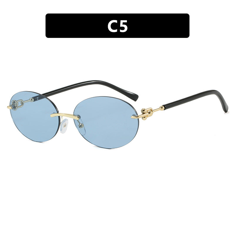 Damen ovale Sonnenbrille mit luxuriösem Metallrahmen und verspiegelten Gläsern Karnz