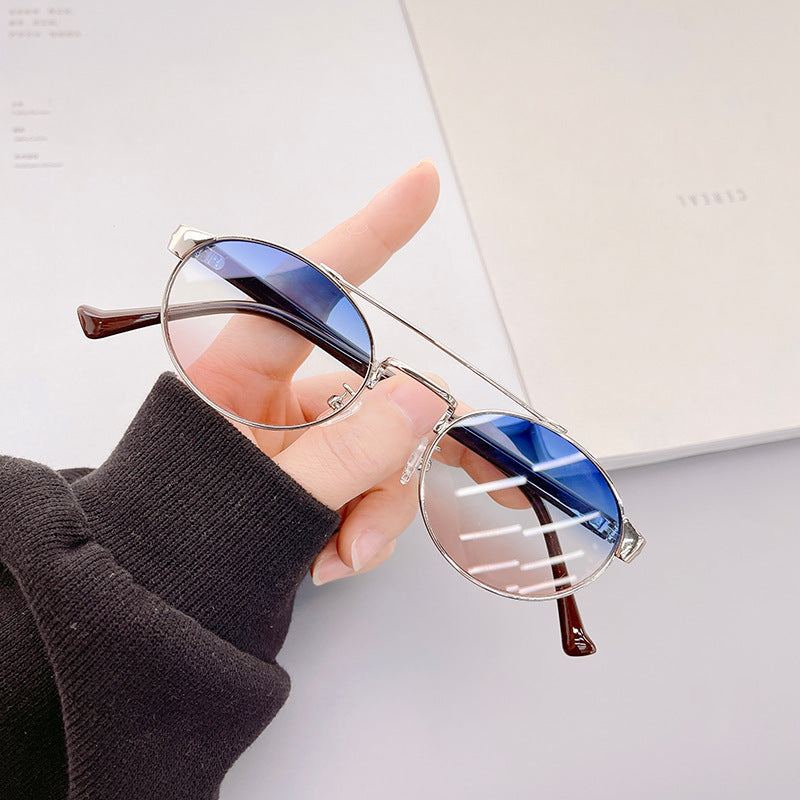 Damen modische Sonnenbrille im stilvollen runden Design mit goldenen Akzenten Karnz
