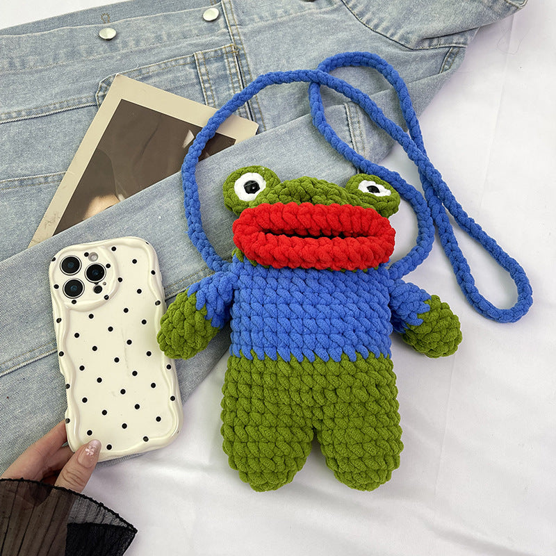 Süßer froschförmiger gehäkelter Mini-Rucksack