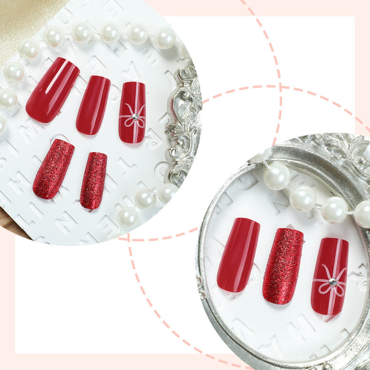 Kreatives Kunstnagelset mit Glitzer- und Schleifenmotiven Karnz
