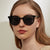 Damen modische Sonnenbrille mit modernem Kunststoffrahmen Karnz