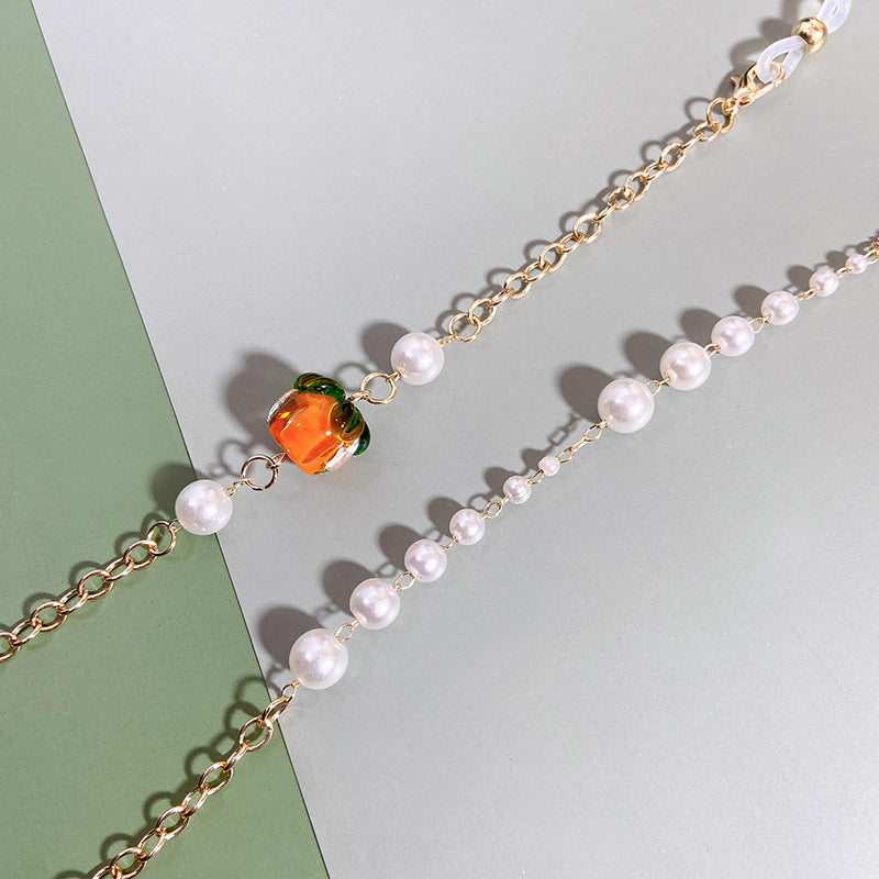 Elegante Kette mit Perlen und Rubinen Karnz