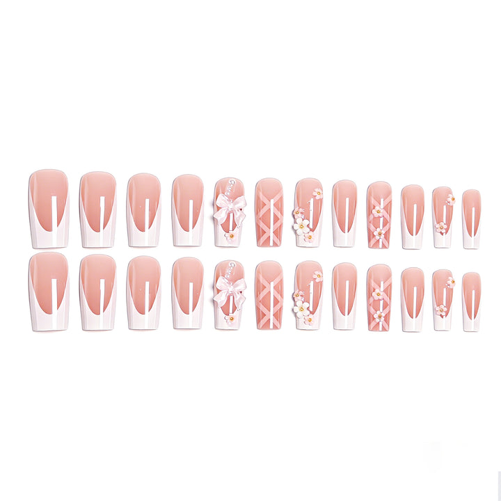 Kunstvolle 3D Nagelspitzen mit Schleifenmotiven Karnz