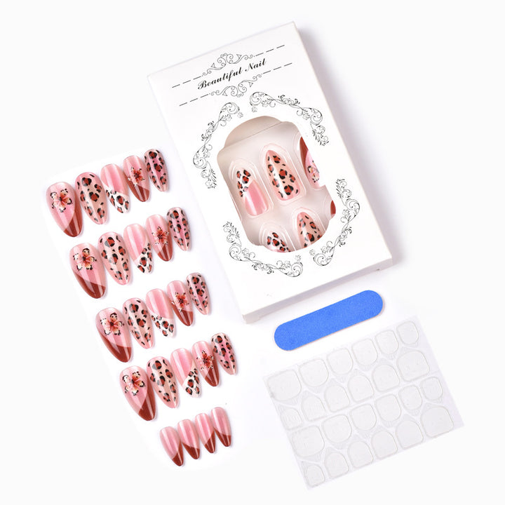 Künstlerisches Press-On Nagelkunstset mit floralen und Leoparden Designs