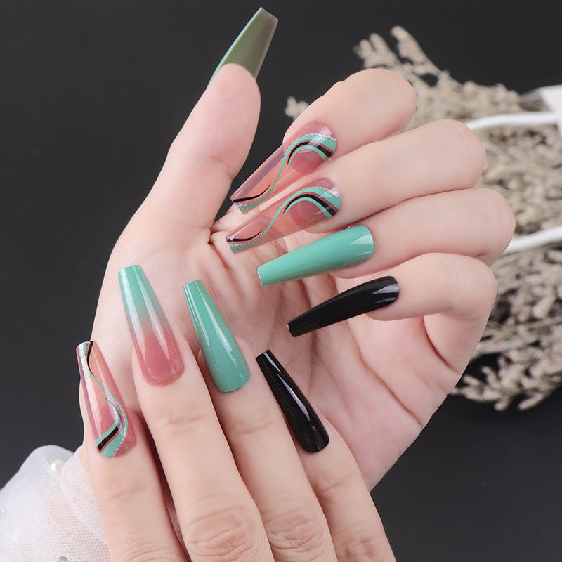 Künstlerisches Press-On Nagelset mit geometrischem Wellenmuster Karnz