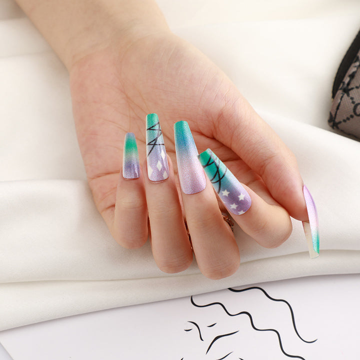 Kunstnägel mit Sternen- und Mond-Design Karnz