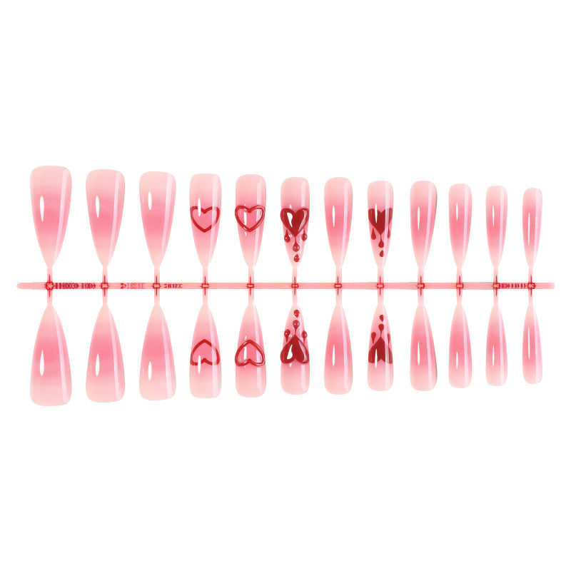 Kunstnägel-Set mit romantischen Herzdesign und zartem Ombre-Effekt Karnz