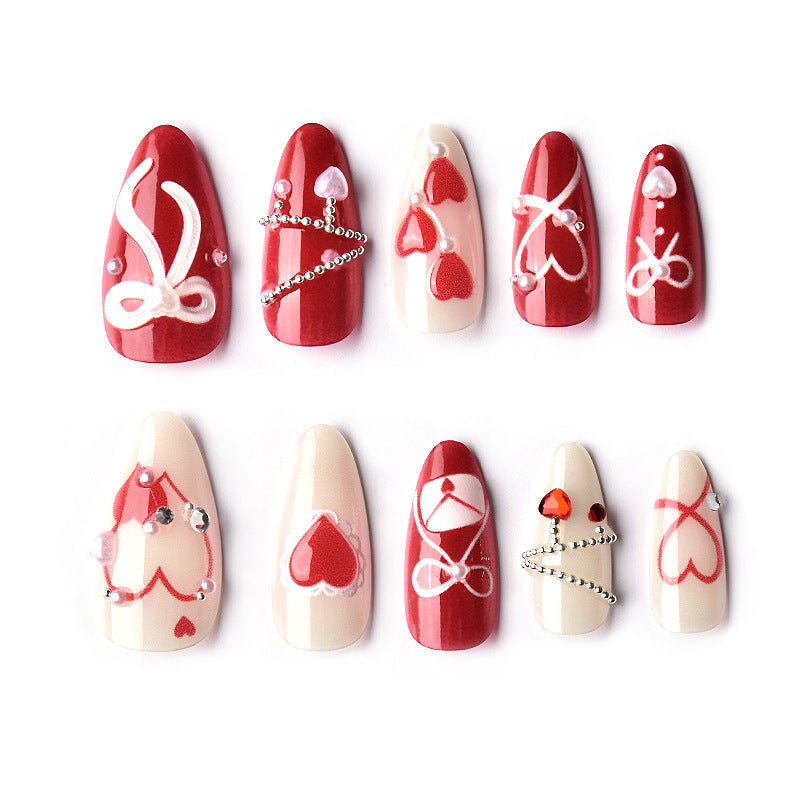 Nageldesign Set mit romantischen Herzmotiven Karnz