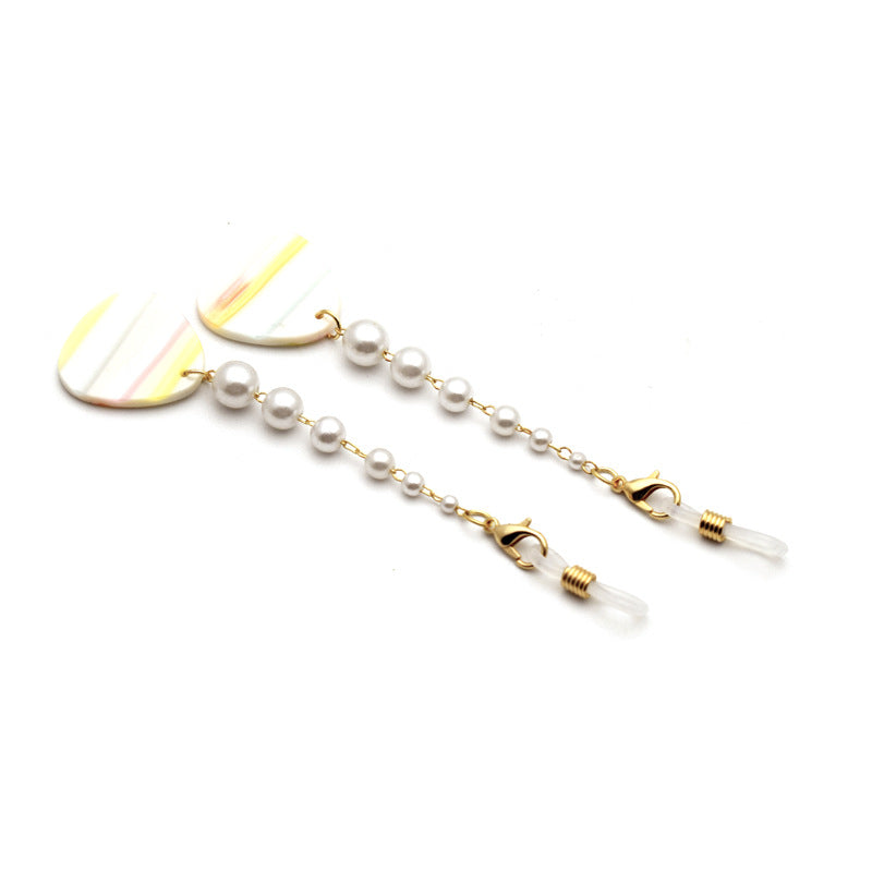 Elegante Tropfenohrringe mit Perlenakzenten Karnz