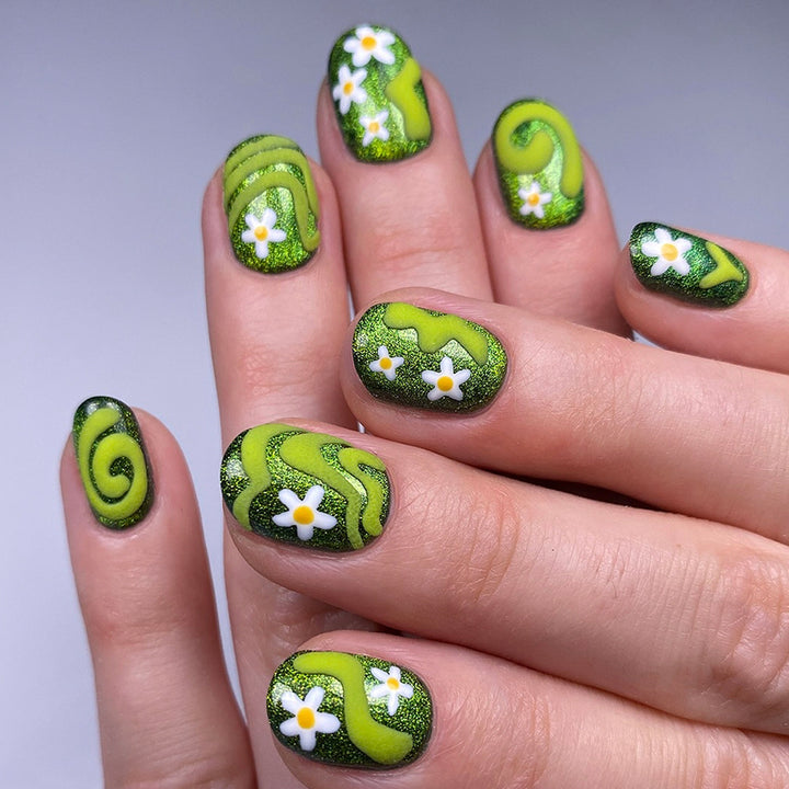 Kunstfingernägel mit Floralen und Glitzernden Akzenten Karnz