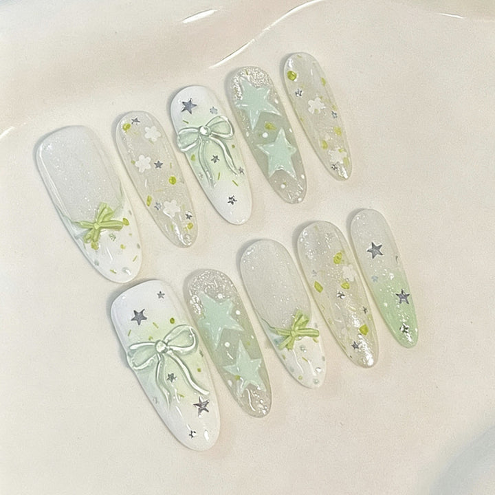 Künstlerisches Press-on-Nagelset mit Sterne- und Blumendesign