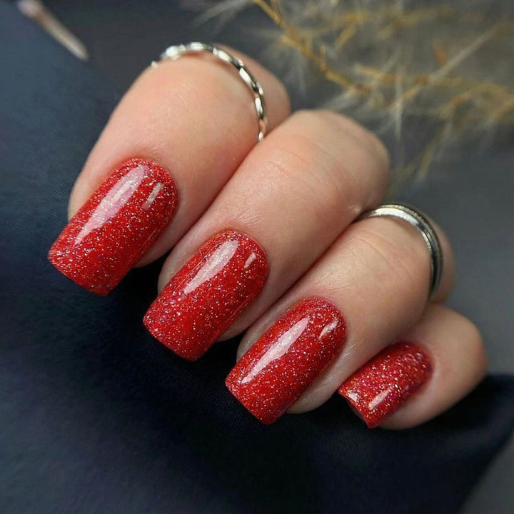 Glitzernde Kunstnägel mit Hochglanz-Effekt Karnz
