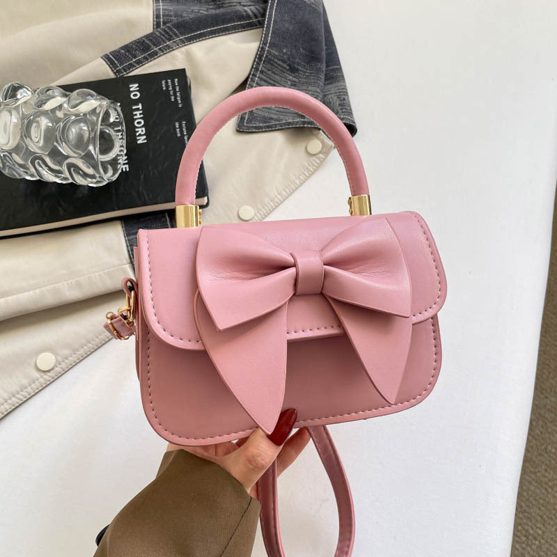 Schultertasche mit Schleifenakzent