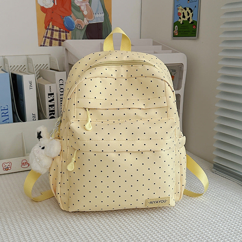 Verspielter gepunkteter Rucksack