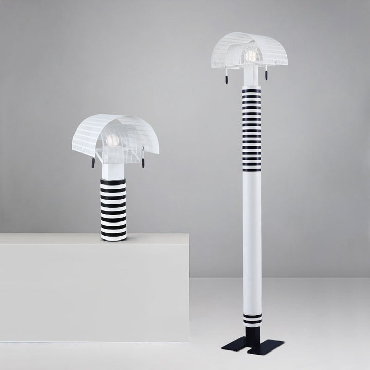 Moderne dekorative Tischlampe mit gestreiftem Fuß