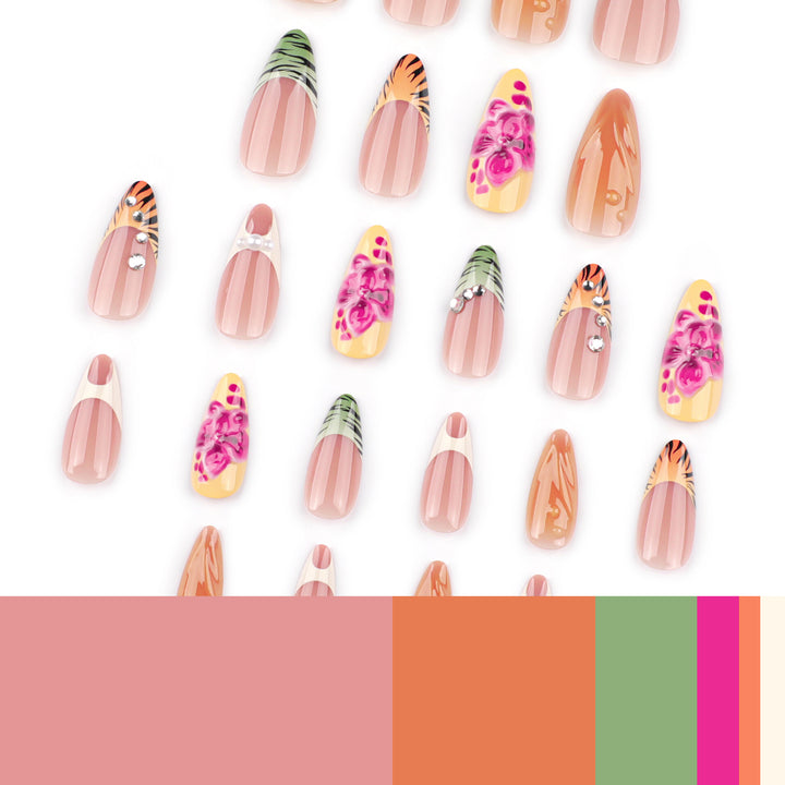 Kunstvolle Stiletto-Nägel mit buntem Blüten-Design und Glitzer Karnz