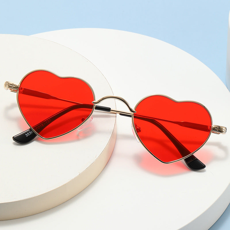 Damen Herzförmige Sonnenbrille mit filigranem Metallrahmen Karnz