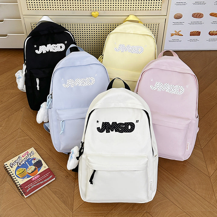 Trendy lässiger Tagesrucksack mit süßem Charakterakzent Karnz