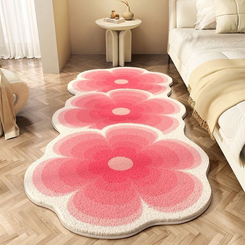 Süßer blumenförmiger Teppich