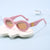Damen modische Sonnenbrille mit ovalem Rahmen und goldenen Applikationen Karnz