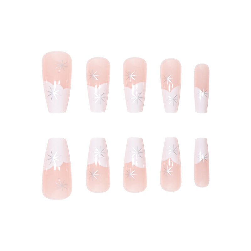 Elegante French Tip Press-On Nägel mit Sternakzenten Karnz