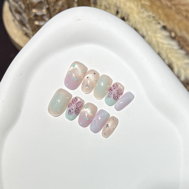 Floral-inspiriertes Press-On-Nagelkunst-Set mit Sternakzenten Karnz