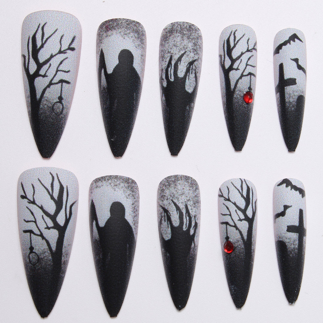 Kreative Kunstnägel mit düsterem Halloween-Motiv Karnz