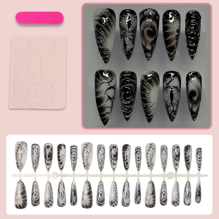 Kunstnagelset mit modernem Spiralmuster und glänzenden Akzenten Karnz
