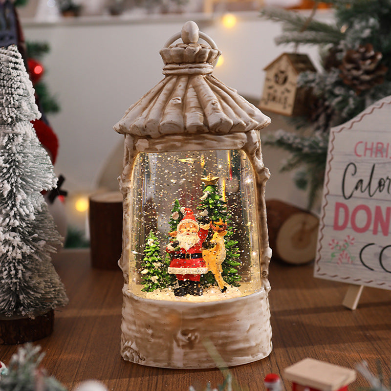 Beleuchtete Weihnachtslaterne mit Schneeszenen Karnz