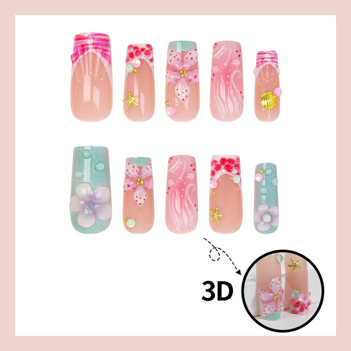 Kunstnagelset mit floralen Akzenten und eleganten Details Karnz