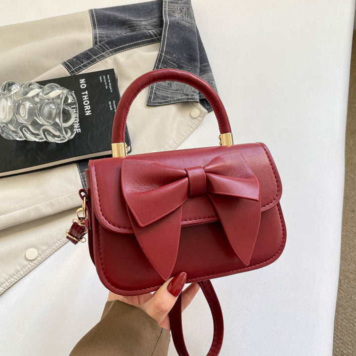 Schultertasche mit Schleifenakzent