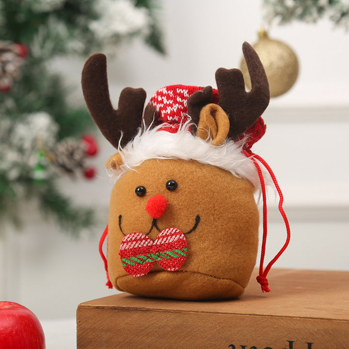 Niedlicher Weihnachtsgnom mit Geschenkesack Karnz