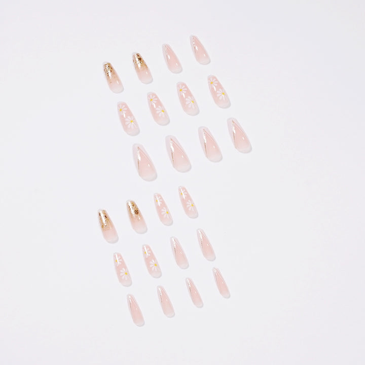 Kunstvolle Nagelverlängerungen mit floralen Designs und Glitzerakzenten Karnz