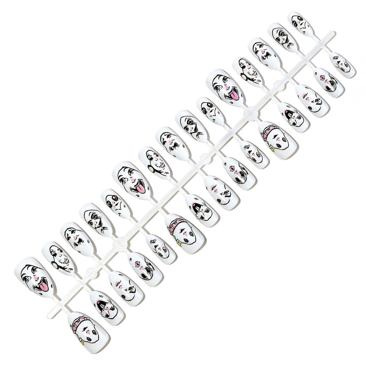 Kreatives Kunstnagelset mit Gesichtsmotiven Karnz