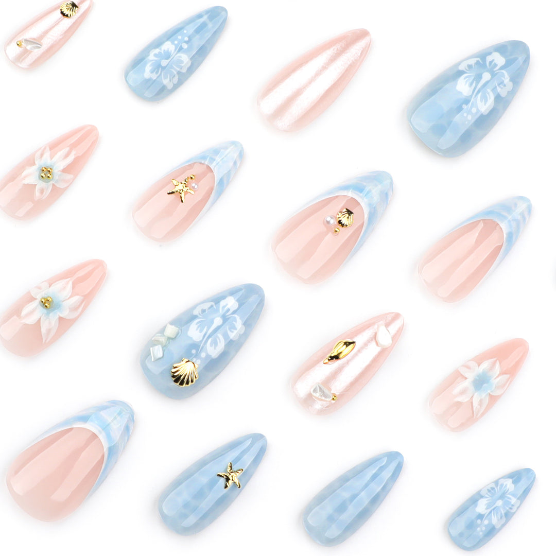 Kunstvolle Nagelverlängerungen mit zarten floralen Designs und Glitzerakzenten Karnz
