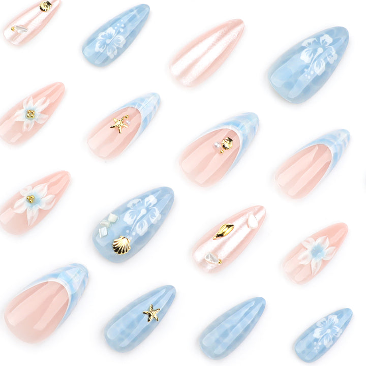 Kunstvolle Nagelverlängerungen mit zarten floralen Designs und Glitzerakzenten Karnz