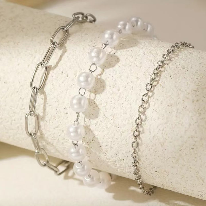 Elegantes Schichten Perlen- und Kettenarmband-Set Karnz
