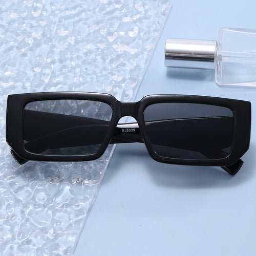 Damen Modische Rechteck-Sonnenbrille mit ausgefallenem Rahmen Karnz