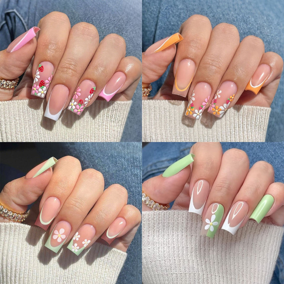 Kunstnagelset mit bunten Blüten und kreativem French-Design Karnz