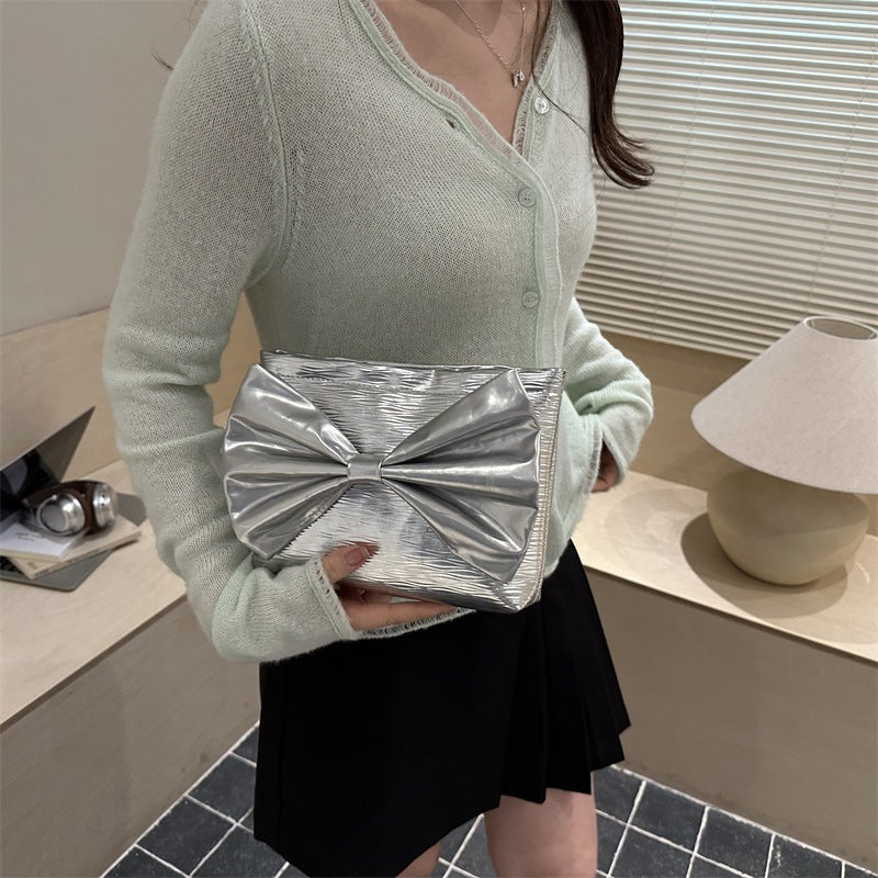 Elegante Schleifen-Knoten Clutch