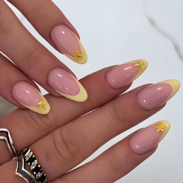 Elegante Stiletto-Nagelkunst-Tipps mit Seestern-Akzenten Karnz