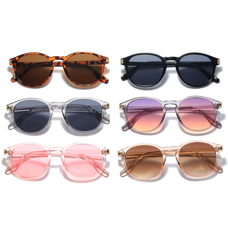 Damen elegante Sonnenbrille mit transparentem Rahmen und stylischen Akzenten Karnz