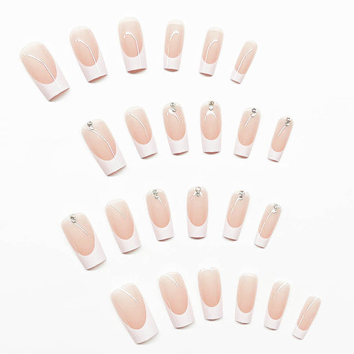 Elegantes Kunstnagelset mit Hochglanz-Finish und Strassverzierungen Karnz