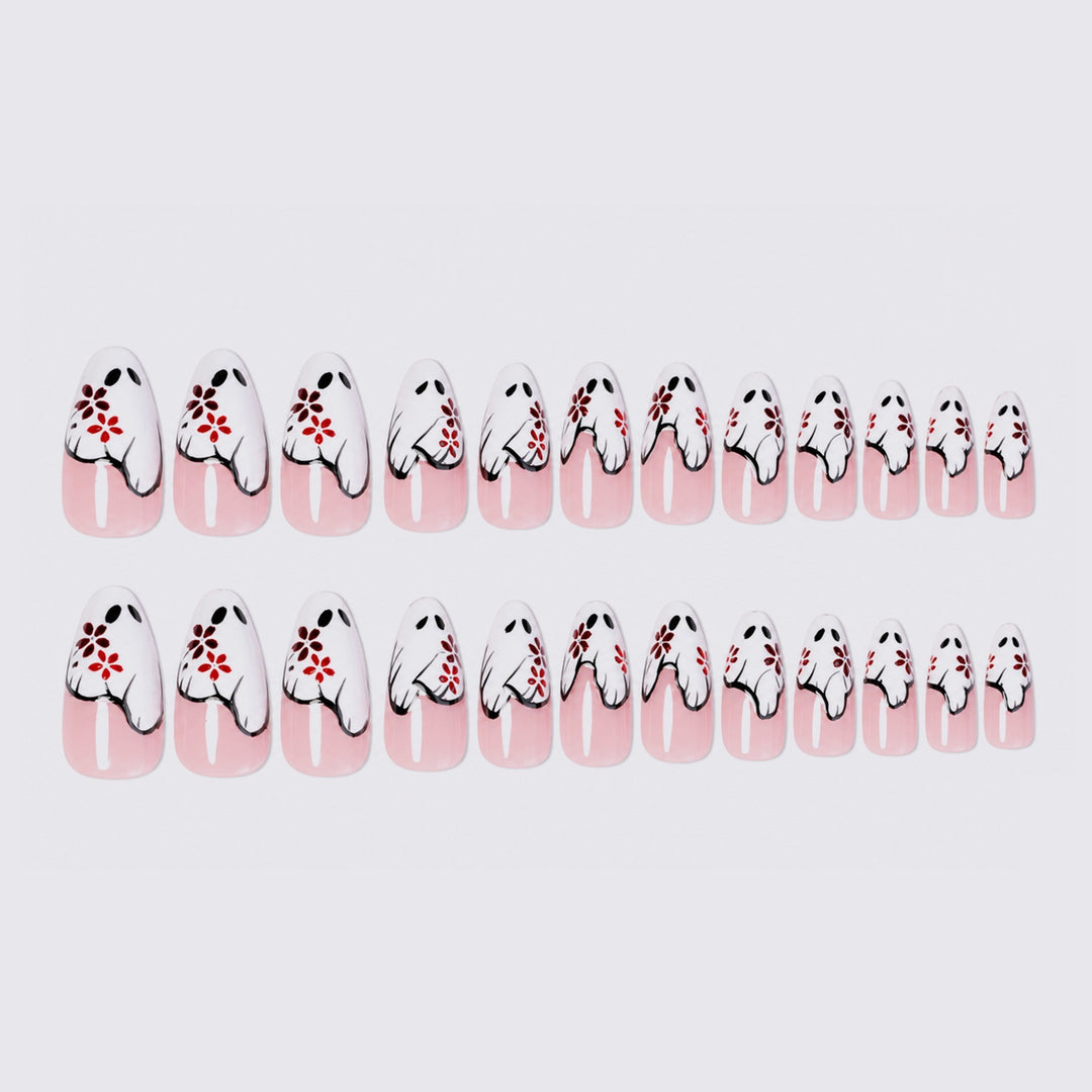 Kunstnagelset mit floralen Motiven und eleganten Verzierungen Karnz